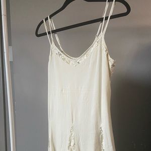 Very cute Little off white dress. Probably meant to be a slip